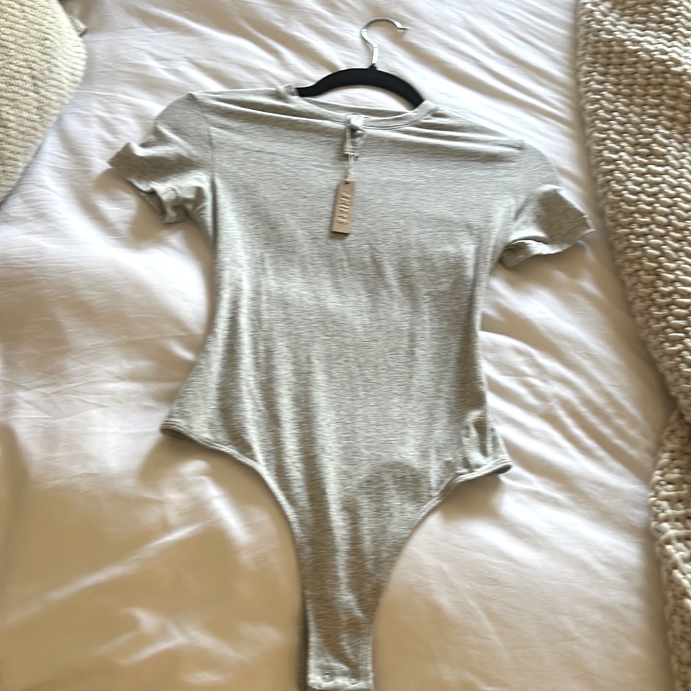 Skims limited edition heather grey body suit sized small